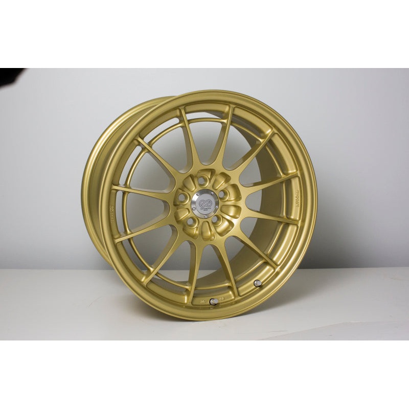 18×9.5 Enkei NT03+M, 5×100 40mm Offset Gold Wheel